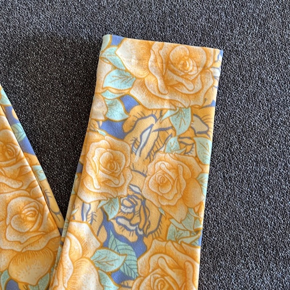 LuLaRoe rose print leggings OS yellow and lavender. - Picture 4 of 7